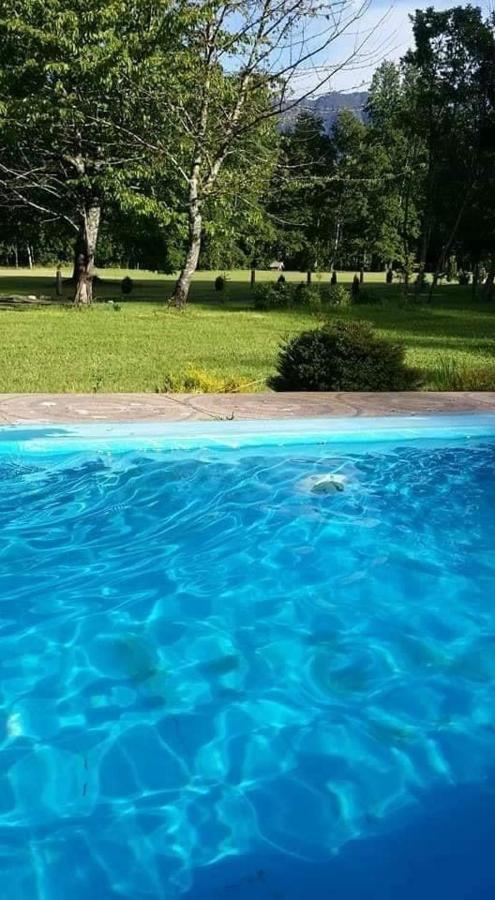 Hosteria Y Camping Del Bosque Пукон Экстерьер фото